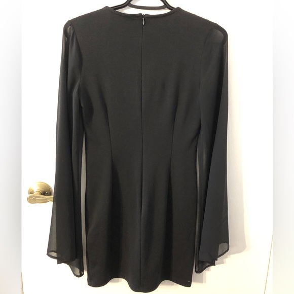 Cute black mini-dress with laced front & sheer sleeves - Picture 5 of 5